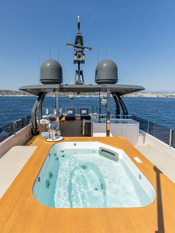 a large ship with a satellite dish on it aboard HAIAMI I Yacht for Sale