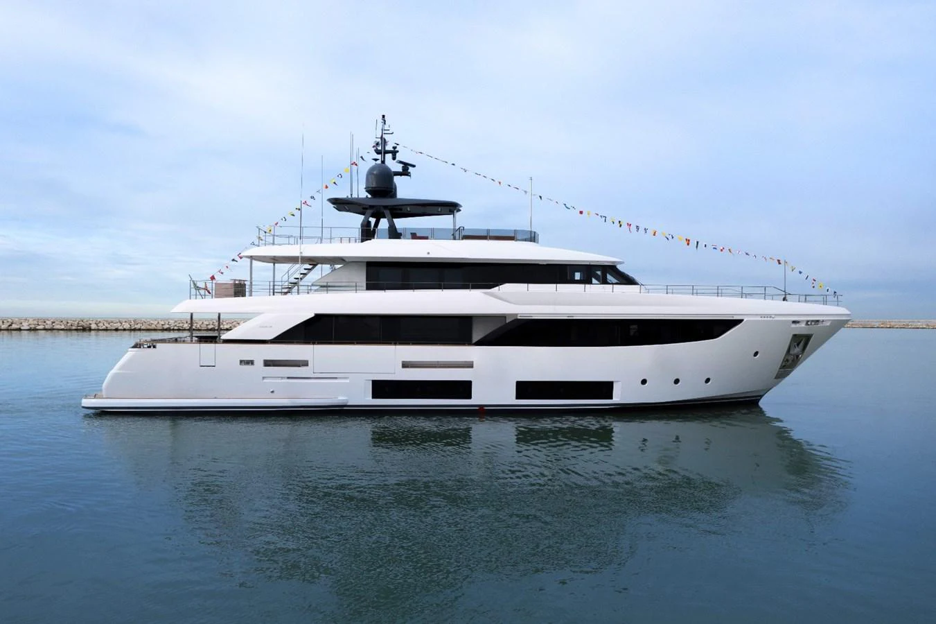a white yacht on the water aboard HAIAMI I Yacht for Sale
