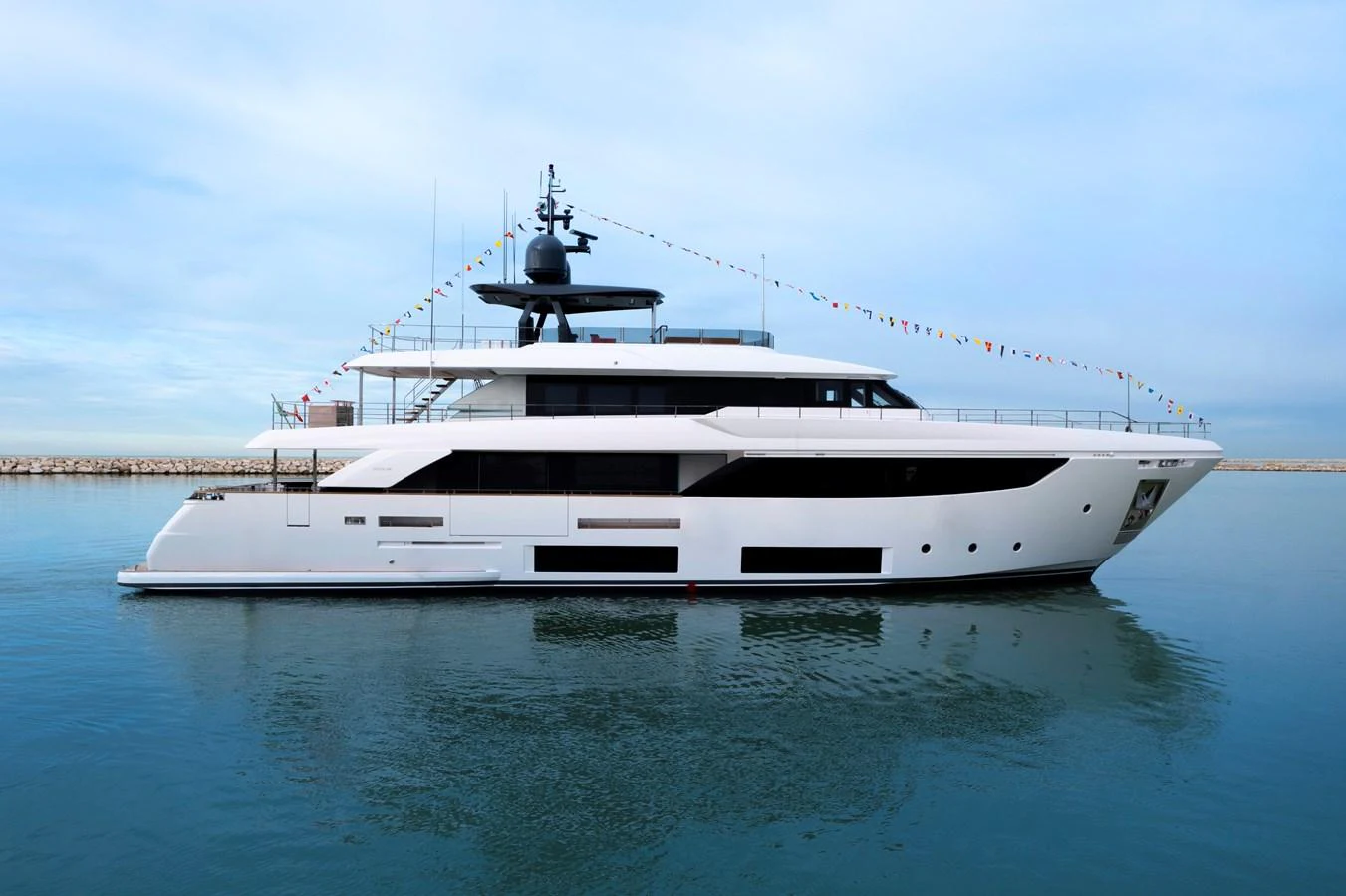 a white yacht on the water aboard HAIAMI I Yacht for Sale