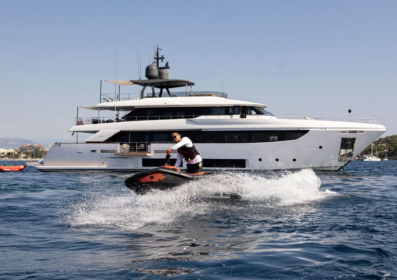a boat with a person on it aboard HAIAMI I Yacht for Sale