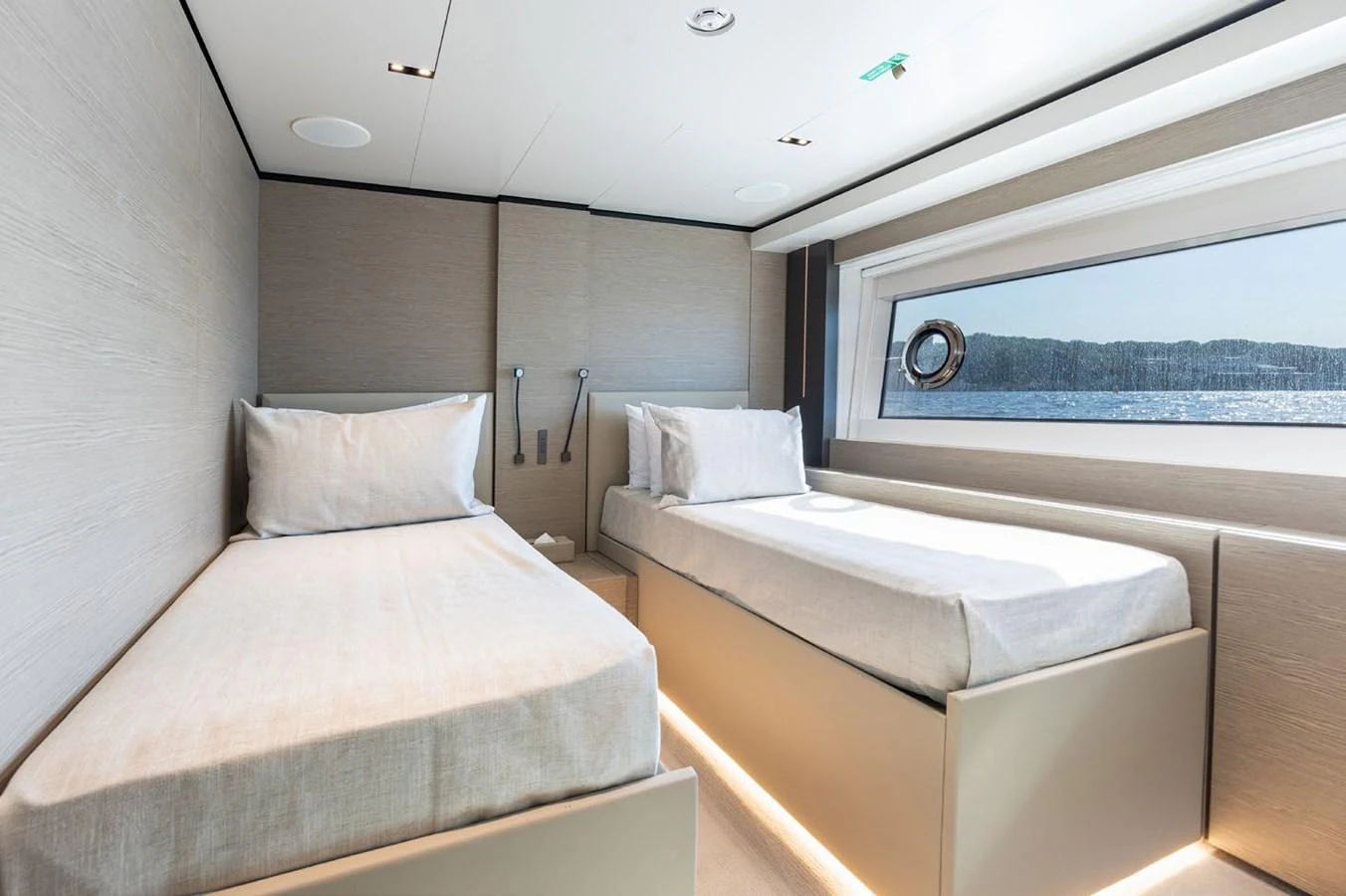 a room with two beds aboard HAIAMI I Yacht for Sale