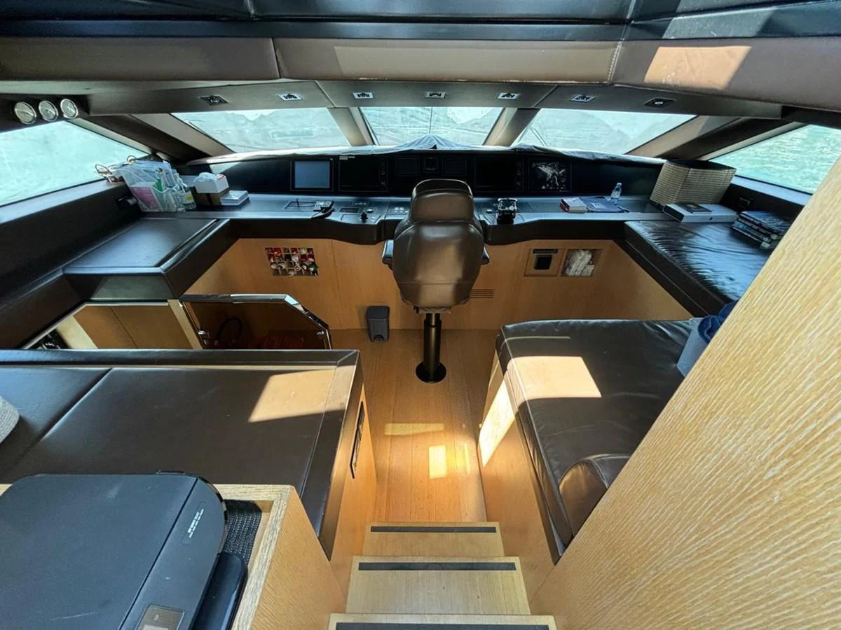 The helm station offers a commanding view with a sleek, modern design and comfortable seating. aboard SANLORENZO Yacht for Sale