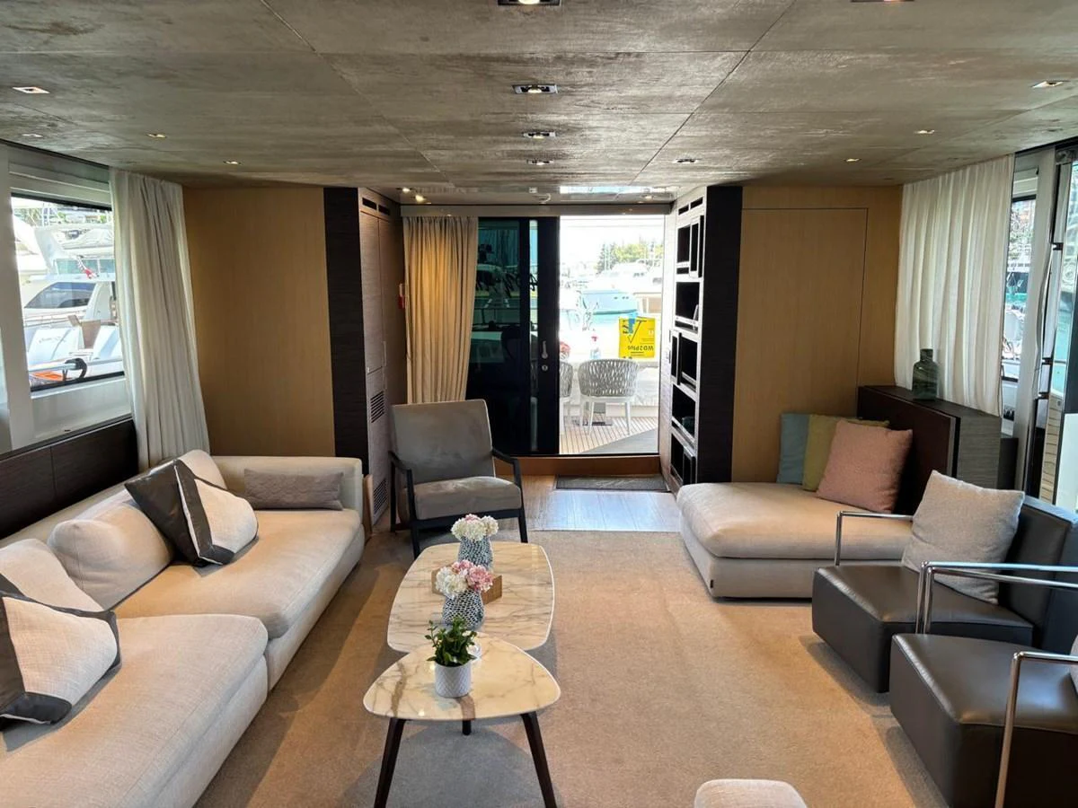 The salon features a spacious and modern seating area with elegant furnishings and ample natural light. aboard SANLORENZO Yacht for Sale