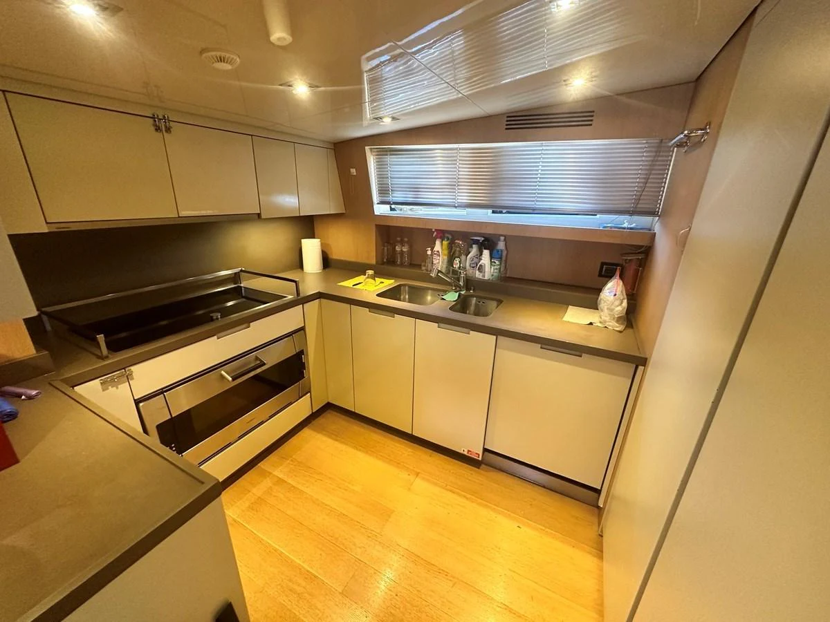 The yacht's galley features modern appliances and ample counter space for meal preparation. aboard SANLORENZO Yacht for Sale