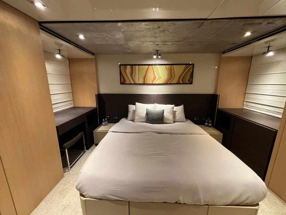 The master stateroom features a luxurious bed with modern decor and ample lighting. aboard SANLORENZO Yacht for Sale