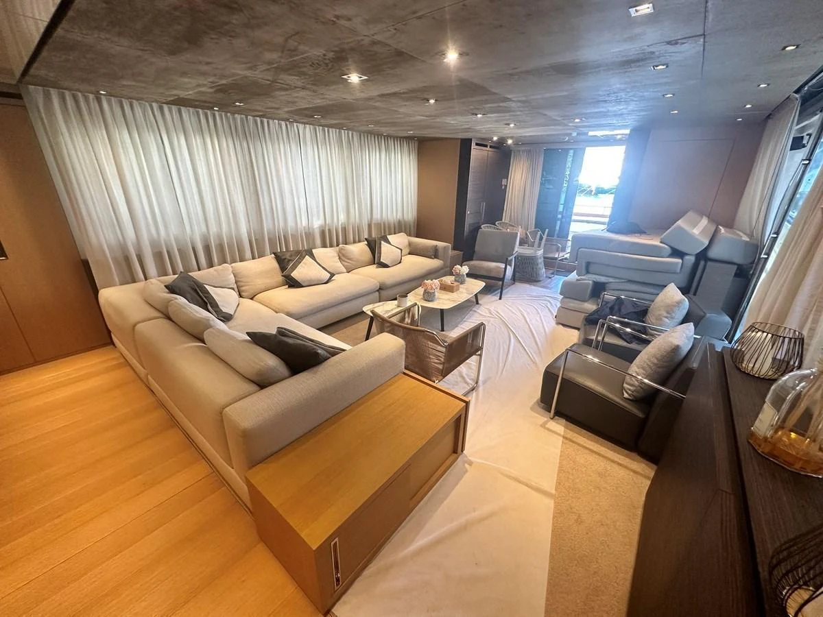 The yacht's salon features a spacious and elegantly furnished seating area with ample natural light. aboard SANLORENZO Yacht for Sale