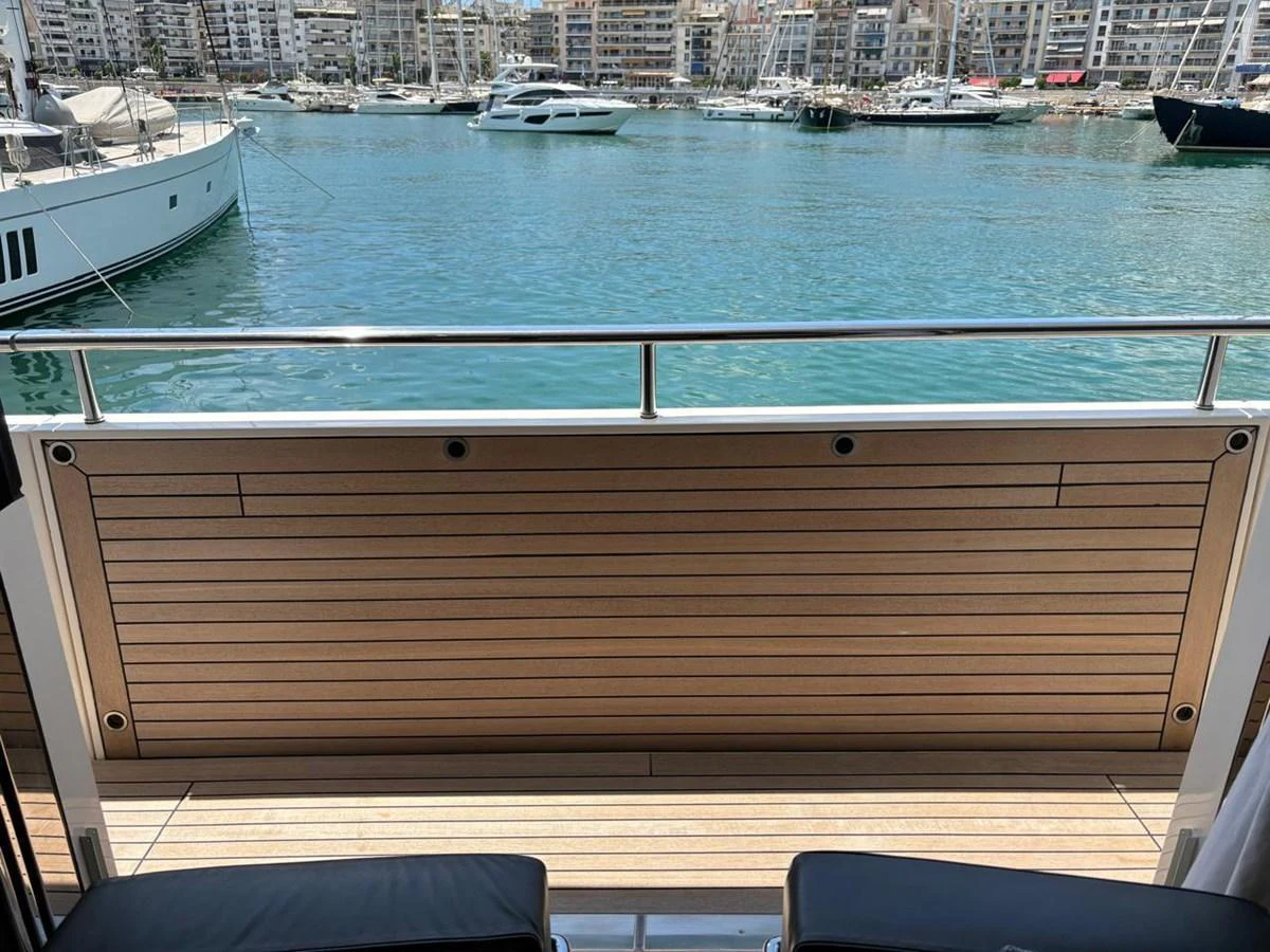 The aft deck offers a serene view of the marina, perfect for relaxation and enjoying the surroundings. aboard SANLORENZO Yacht for Sale