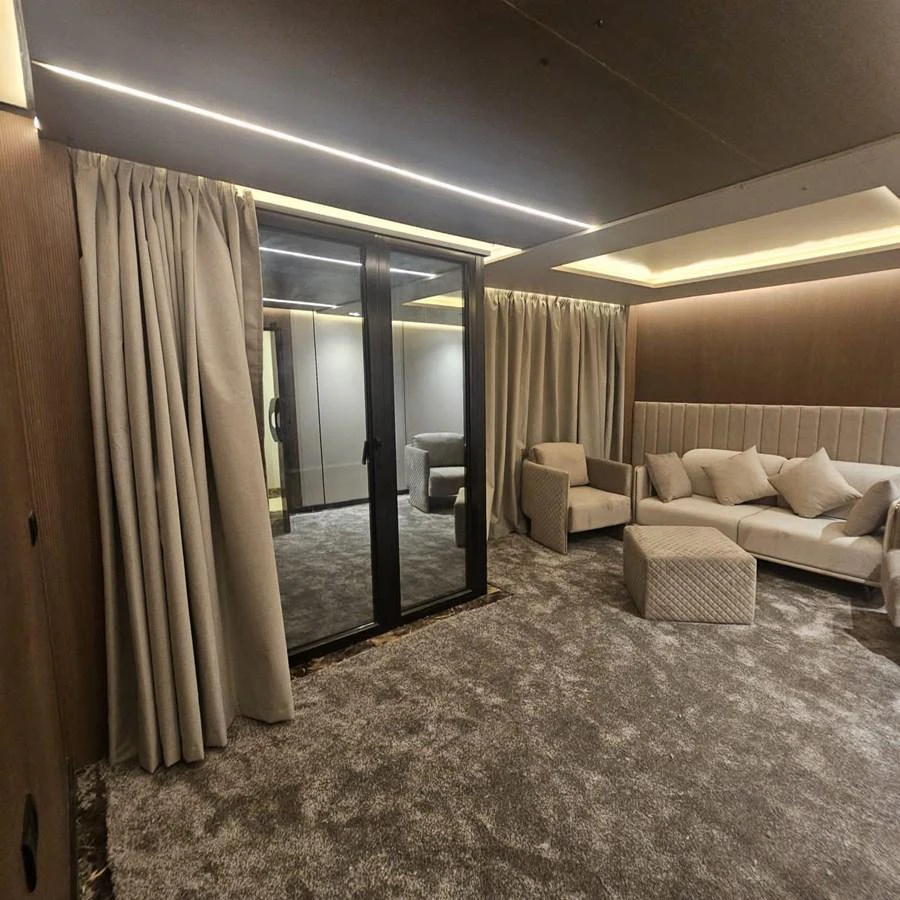 The yacht's salon features plush seating and elegant decor, creating a cozy and inviting atmosphere. aboard JASMINE Yacht for Sale
