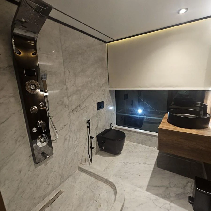 A luxurious bathroom with modern fixtures and marble finishes. aboard JASMINE Yacht for Sale