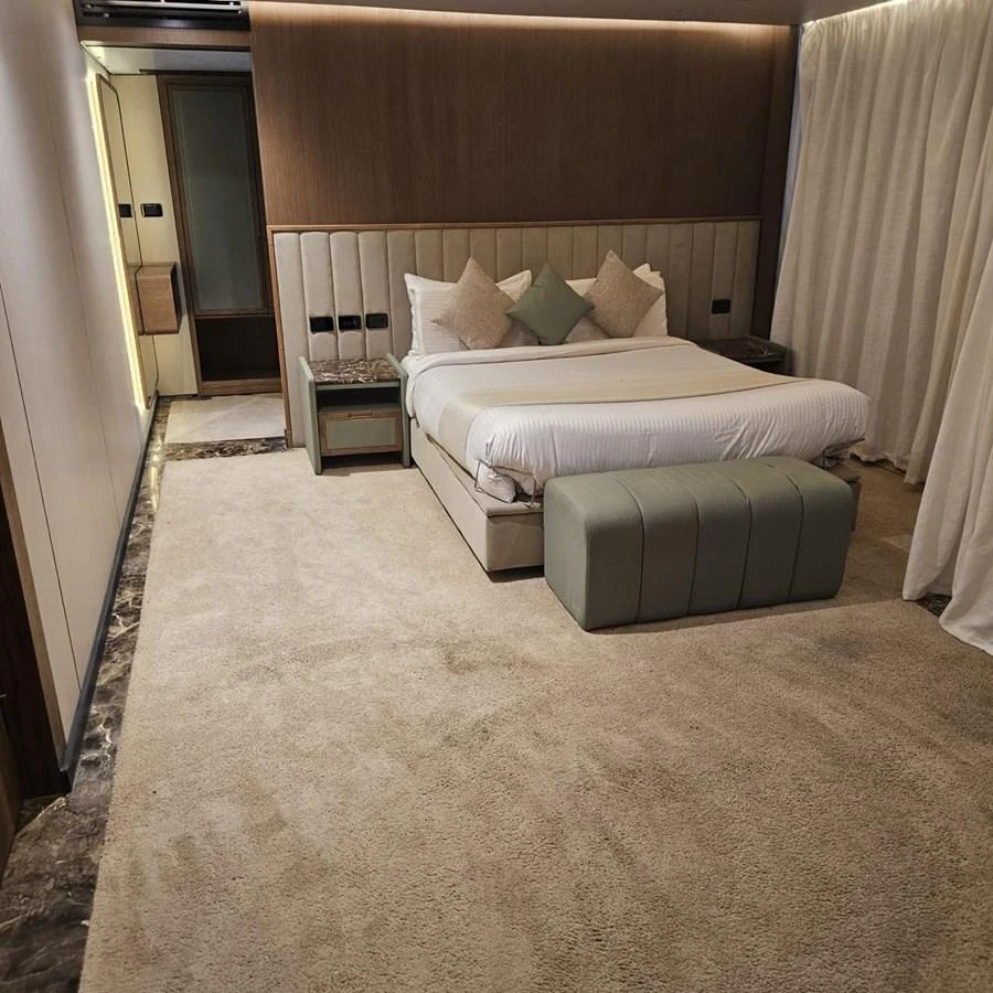The master stateroom features a luxurious bed with elegant decor and ample space. aboard JASMINE Yacht for Sale