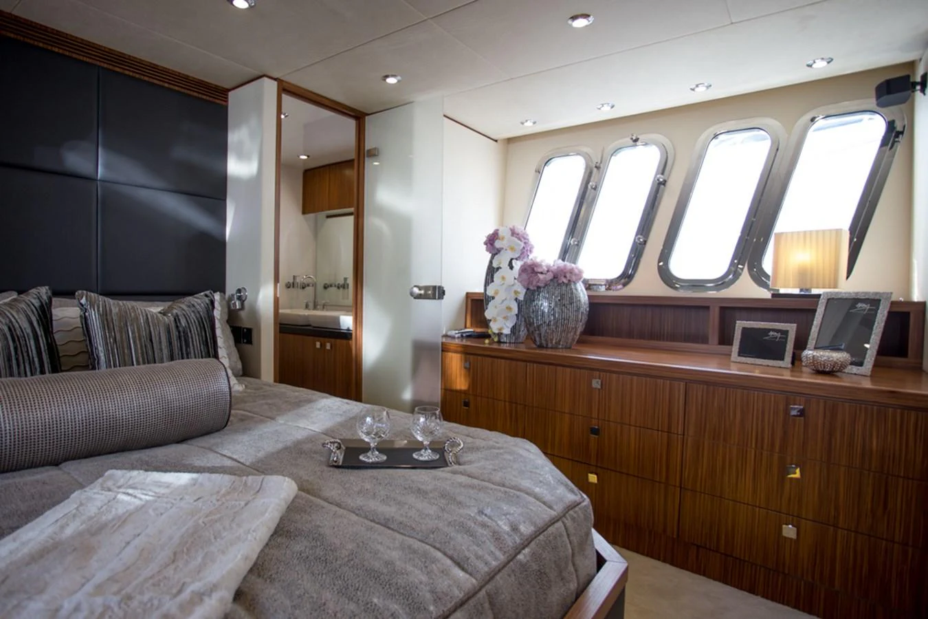 The stateroom features elegant decor with ample natural light from the windows. aboard MAZARIN 72 FLYBRIDGE Yacht for Sale