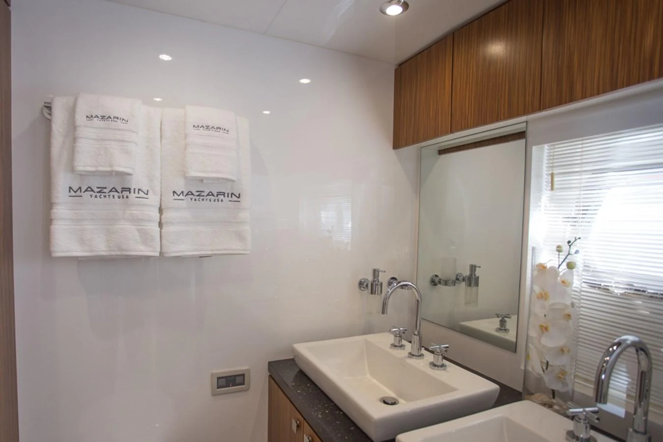 The yacht's bathroom features modern fixtures and elegant design. aboard MAZARIN 72 FLYBRIDGE Yacht for Sale