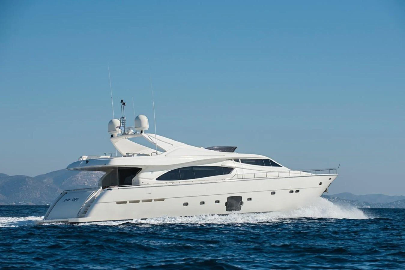 A sleek and modern yacht cruises swiftly through the open water, showcasing its elegant design. aboard FERRETTI 881 Yacht for Sale