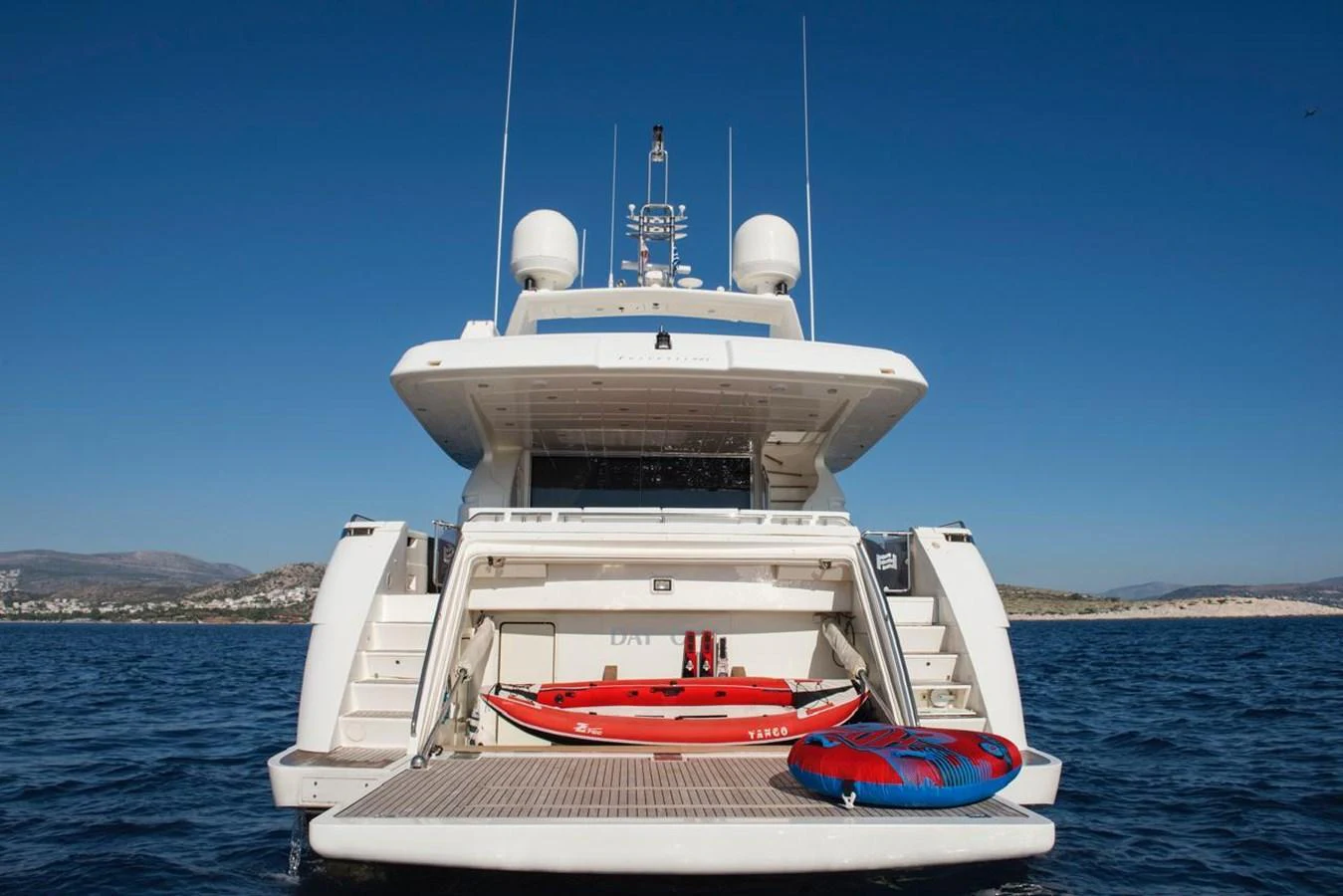 The yacht's aft deck features a spacious swim platform with water toys ready for fun. aboard FERRETTI 881 Yacht for Sale