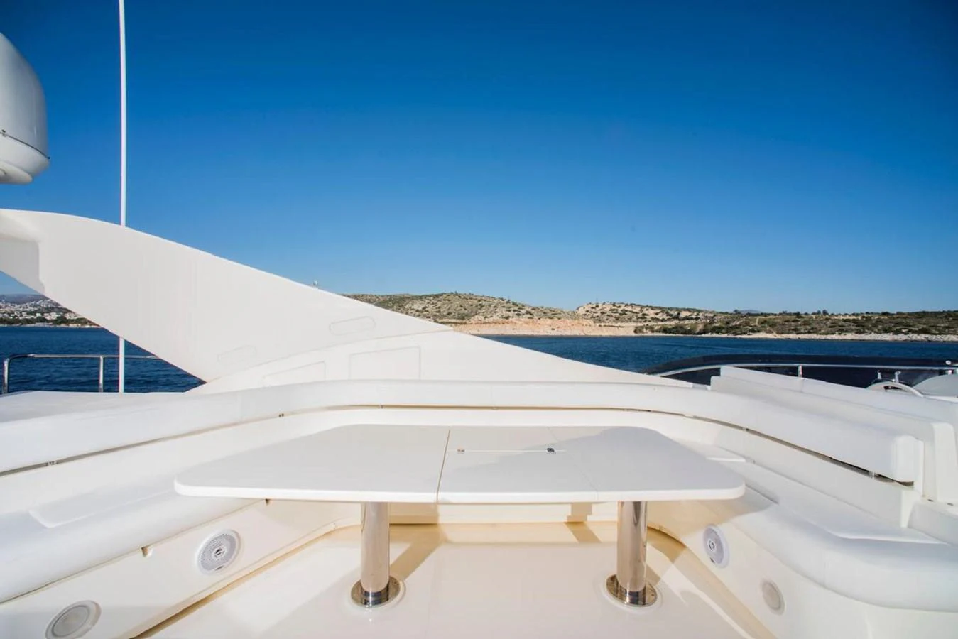 The flybridge offers a spacious and serene area for relaxation with stunning views of the surrounding waters. aboard FERRETTI 881 Yacht for Sale