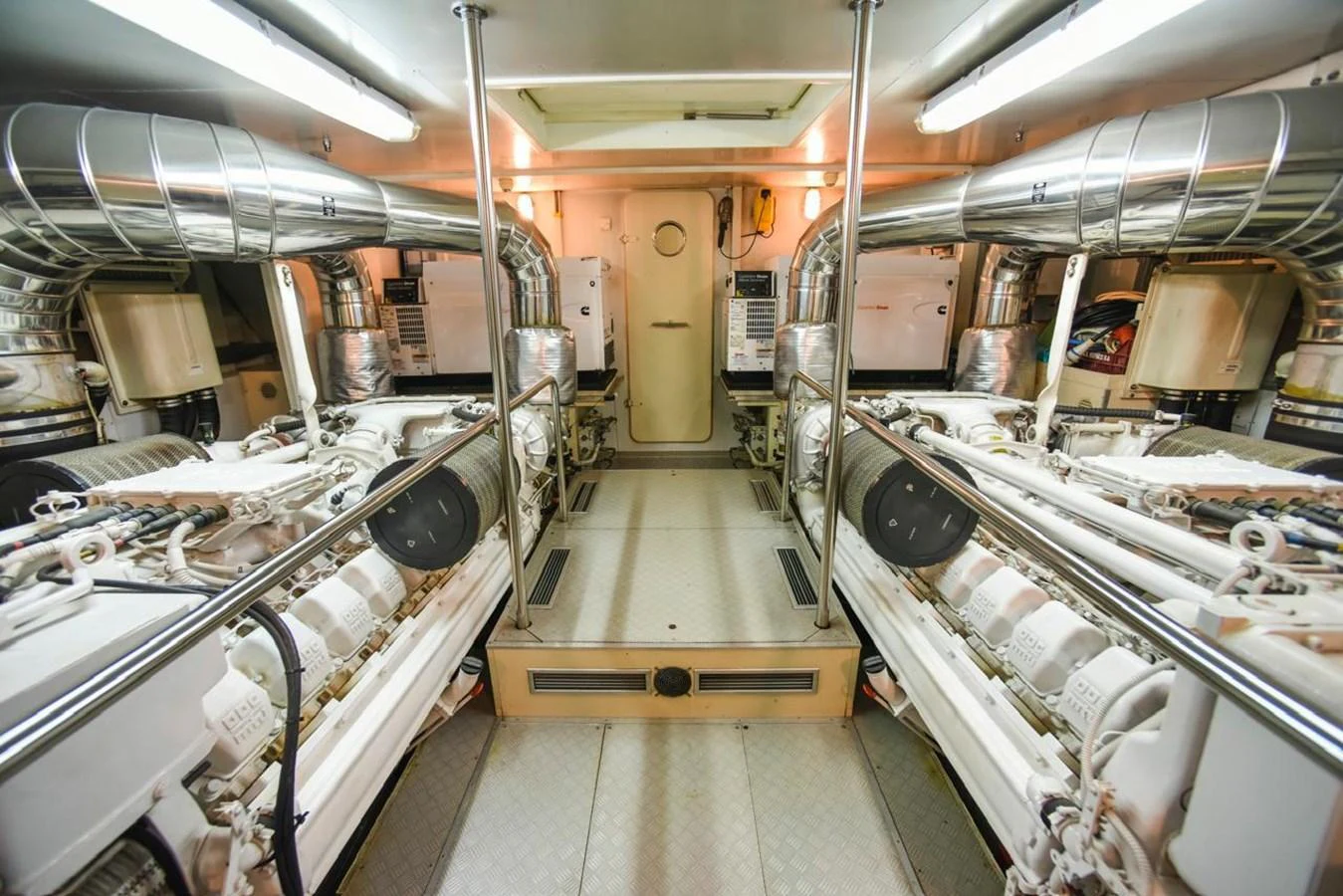 The yacht's engine room showcases powerful and well-maintained machinery. aboard FERRETTI 881 Yacht for Sale
