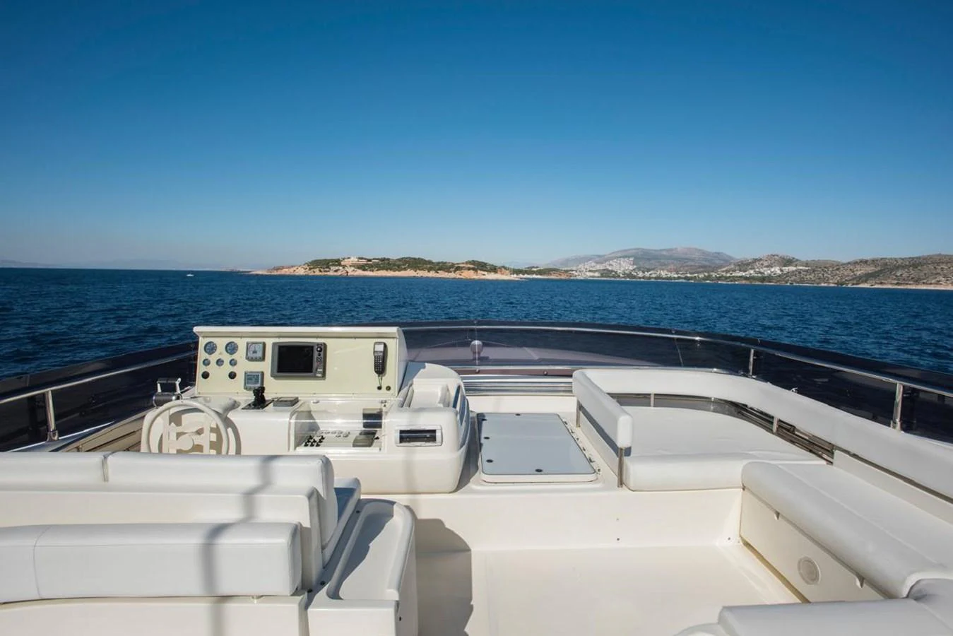 The flybridge offers a spacious and comfortable seating area with panoramic ocean views. aboard FERRETTI 881 Yacht for Sale