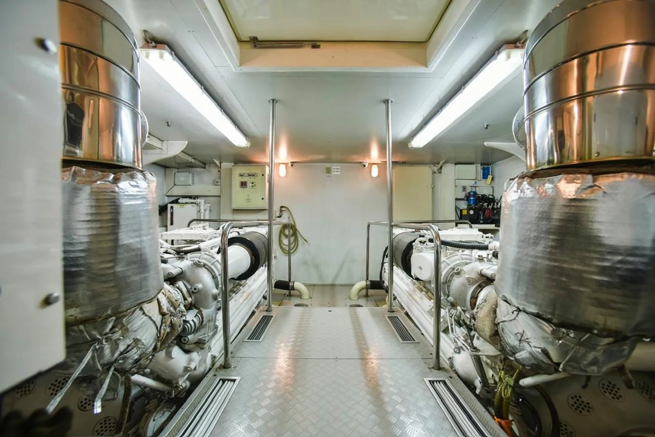 The engine room showcases powerful machinery and a clean, well-organized space. aboard FERRETTI 881 Yacht for Sale