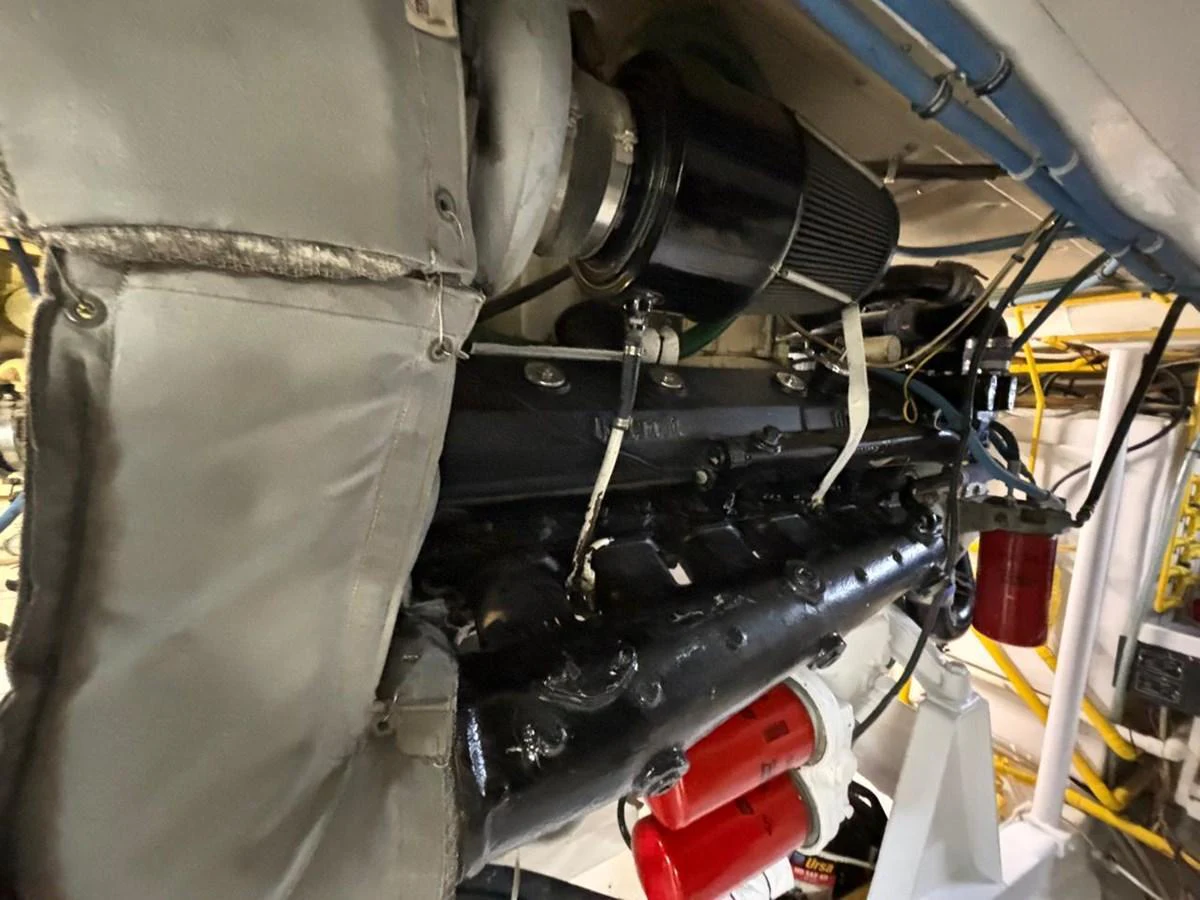 The image showcases the yacht's engine room, highlighting the mechanical components and systems. aboard ADDISYN ANN Yacht for Sale