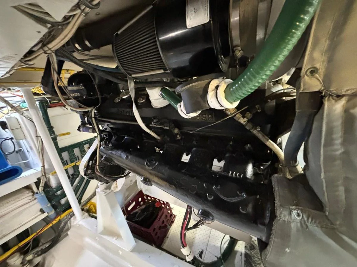 The image showcases the yacht's engine room with visible machinery and components. aboard ADDISYN ANN Yacht for Sale