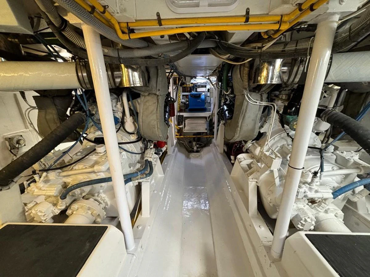 The image showcases the clean and well-maintained engine room of the yacht, highlighting its mechanical components. aboard ADDISYN ANN Yacht for Sale