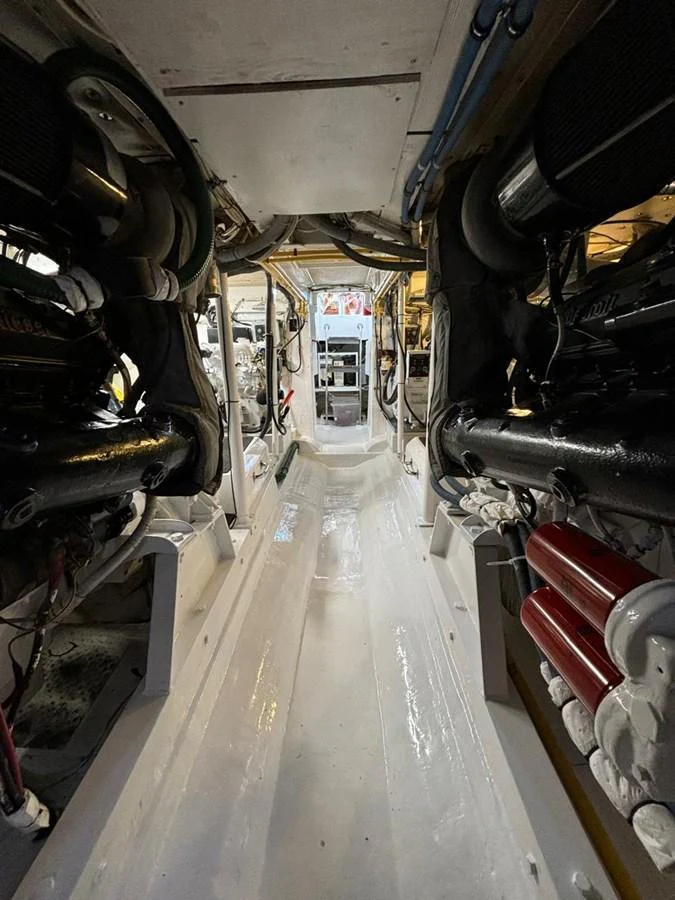 The image showcases the yacht's engine room with visible machinery and equipment. aboard ADDISYN ANN Yacht for Sale