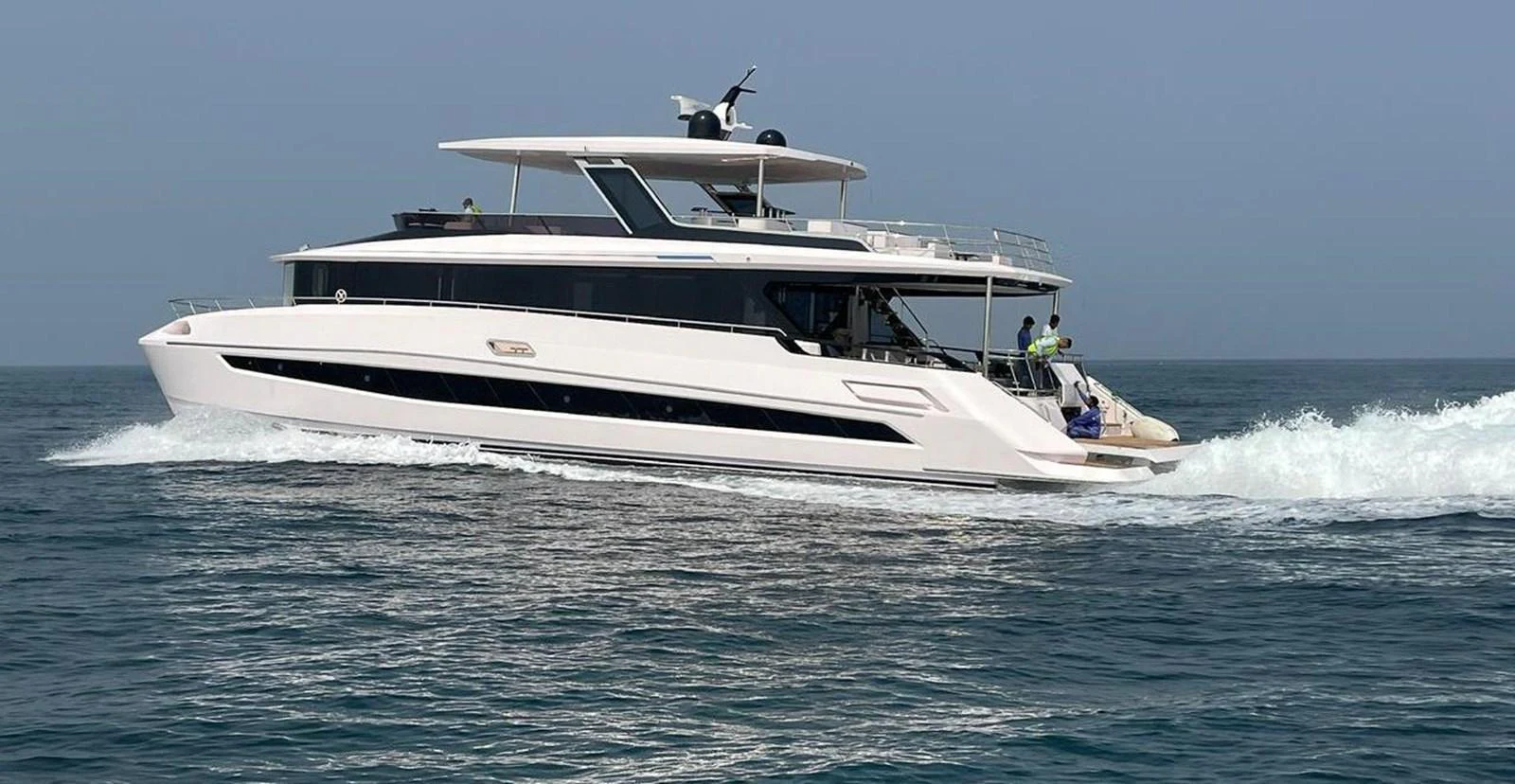 a boat on the water aboard XCEL 70 Yacht for Sale