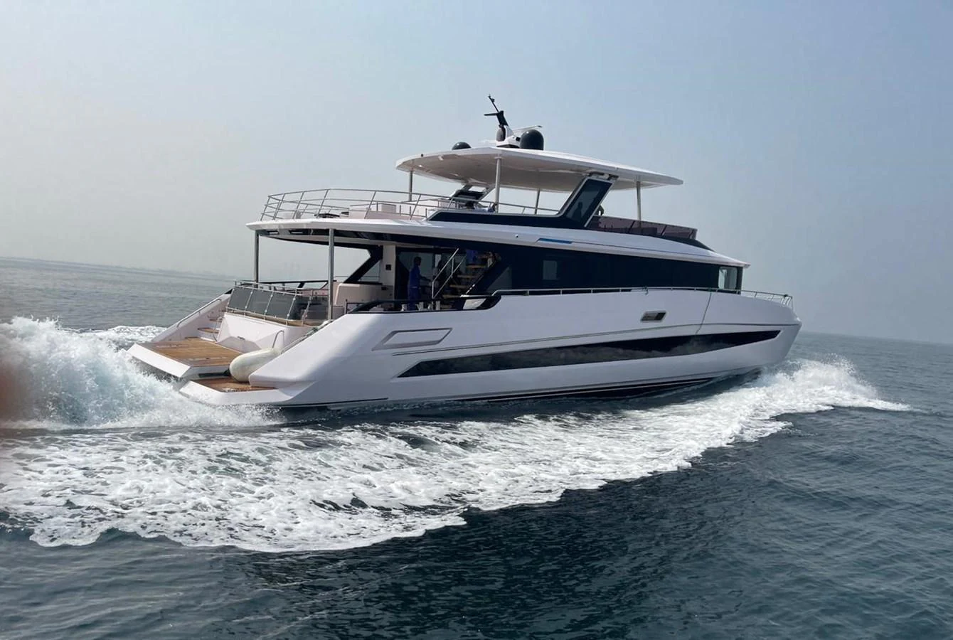 a boat on the water aboard XCEL 70 Yacht for Sale
