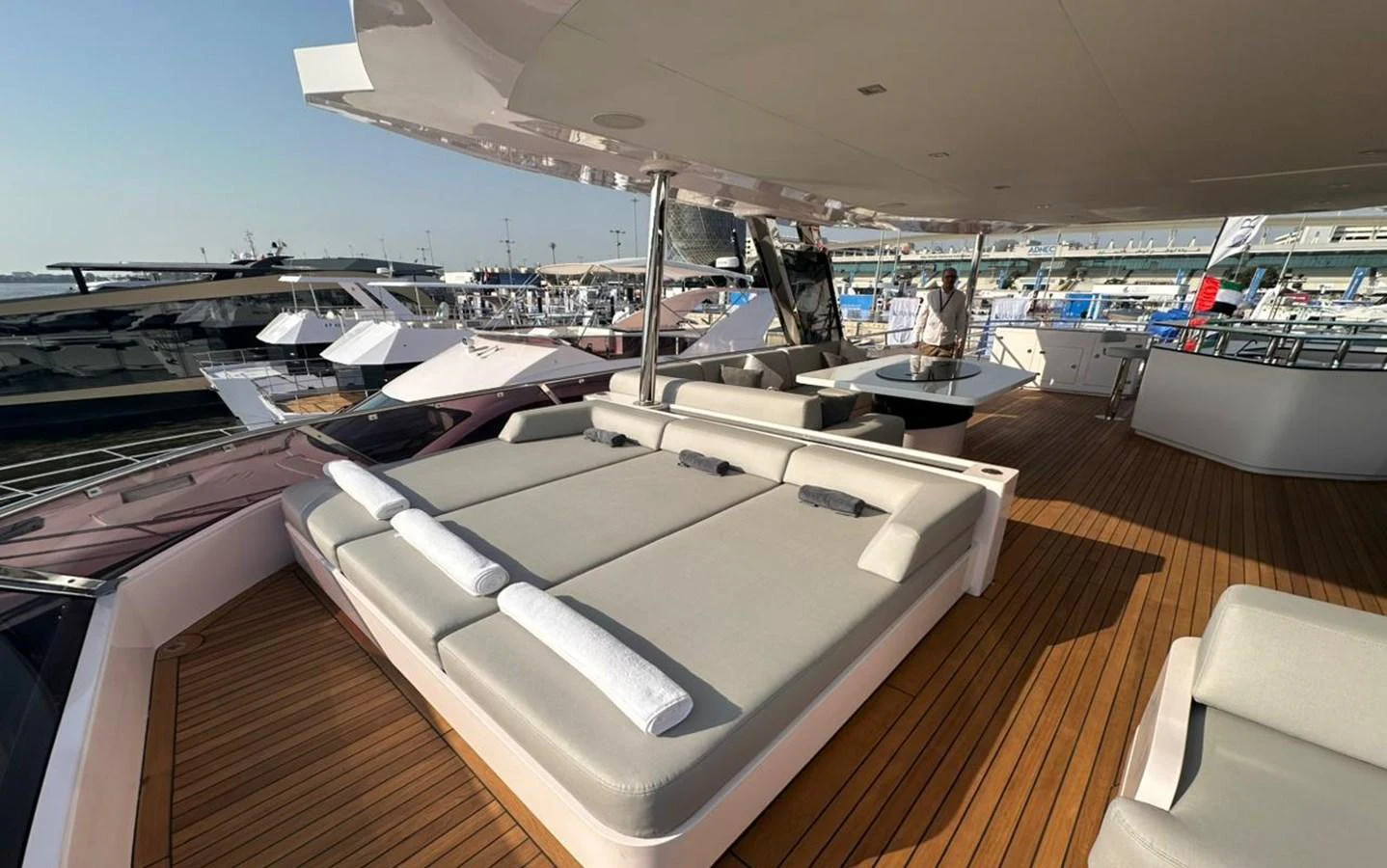 a large room with a large deck aboard XCEL 70 Yacht for Sale