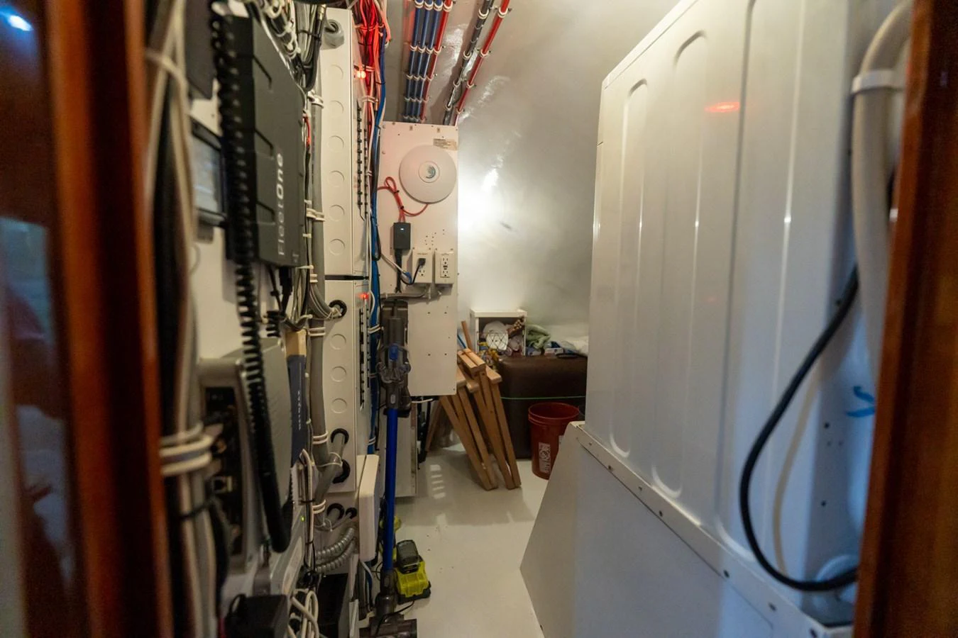 A view of the yacht's technical room showcasing various electrical and mechanical components. aboard VIDA 1 Yacht for Sale