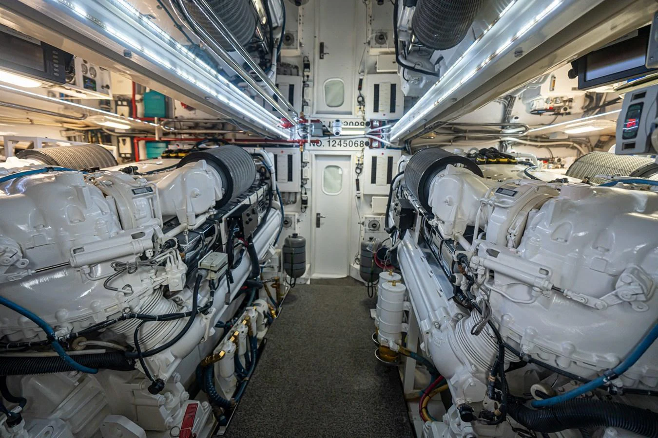 The engine room showcases powerful, well-maintained machinery essential for the yacht's performance. aboard VIDA 1 Yacht for Sale