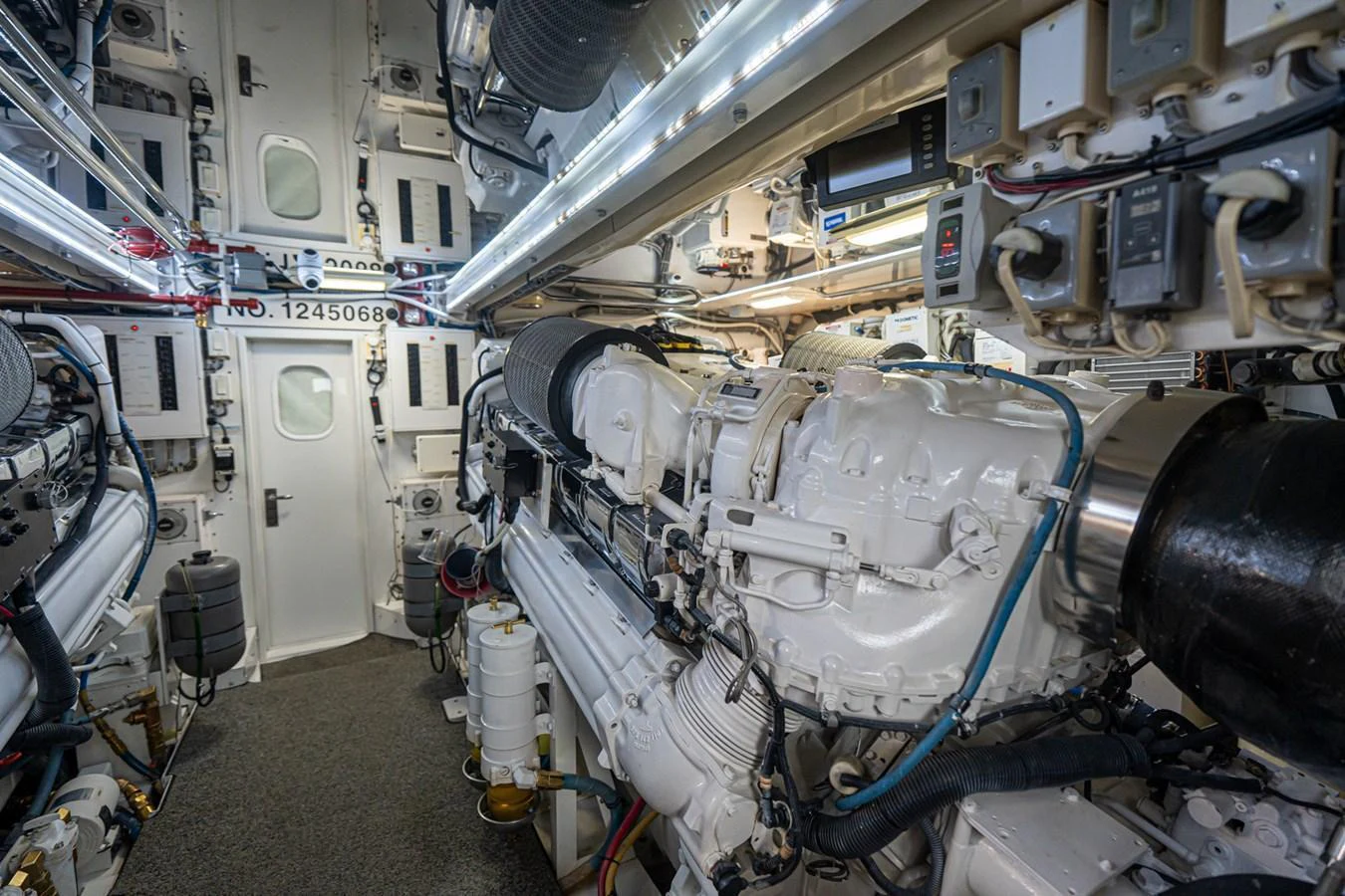 The image showcases the meticulously maintained engine room of the yacht, highlighting its advanced machinery and systems. aboard VIDA 1 Yacht for Sale
