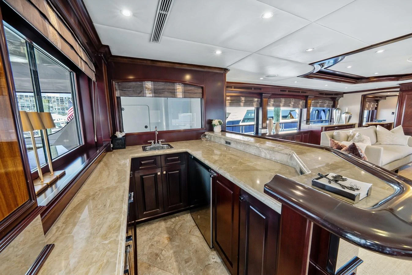a kitchen with a large island aboard NICOLE EVELYN Yacht for Sale