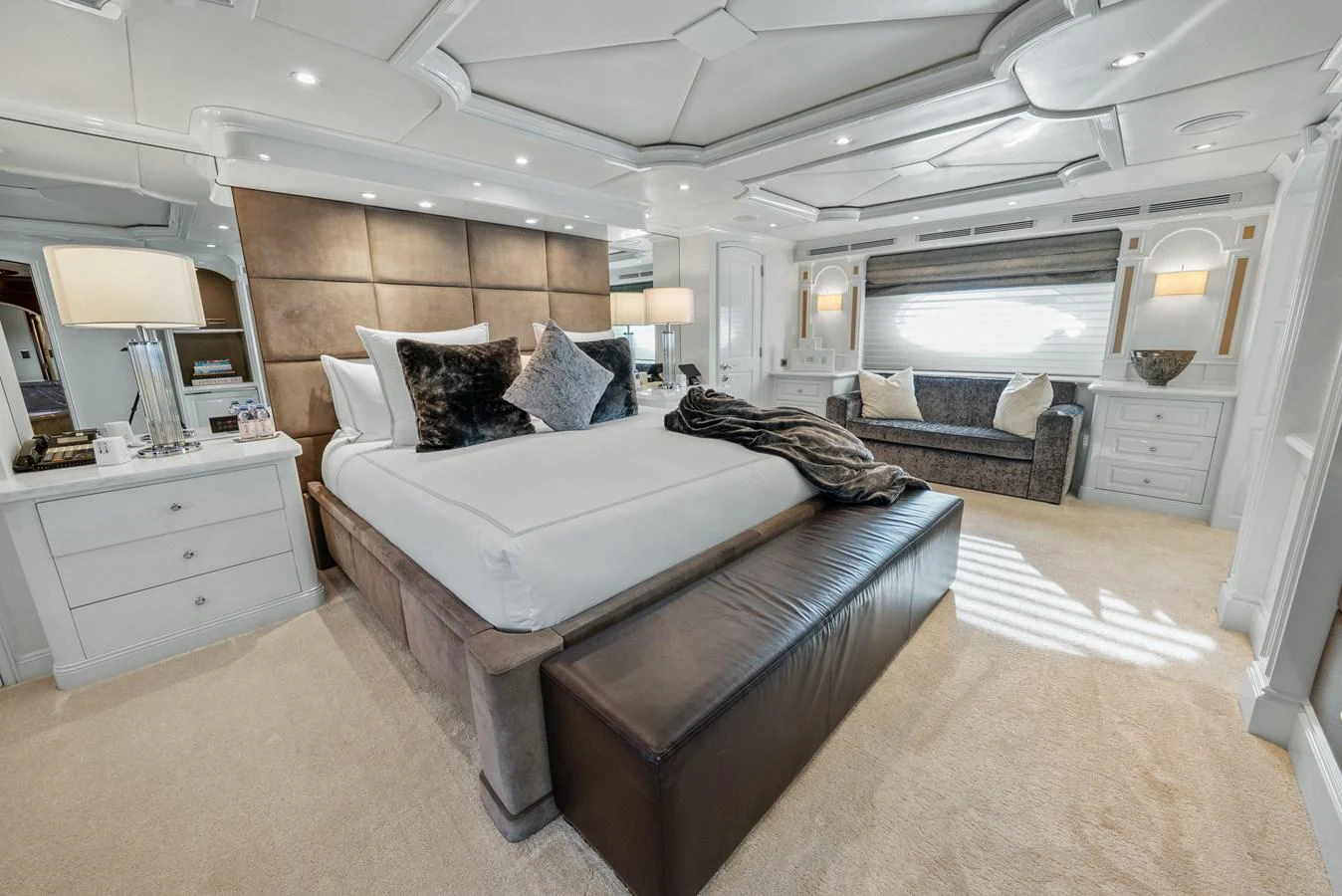 a large bedroom with a bed aboard NICOLE EVELYN Yacht for Sale