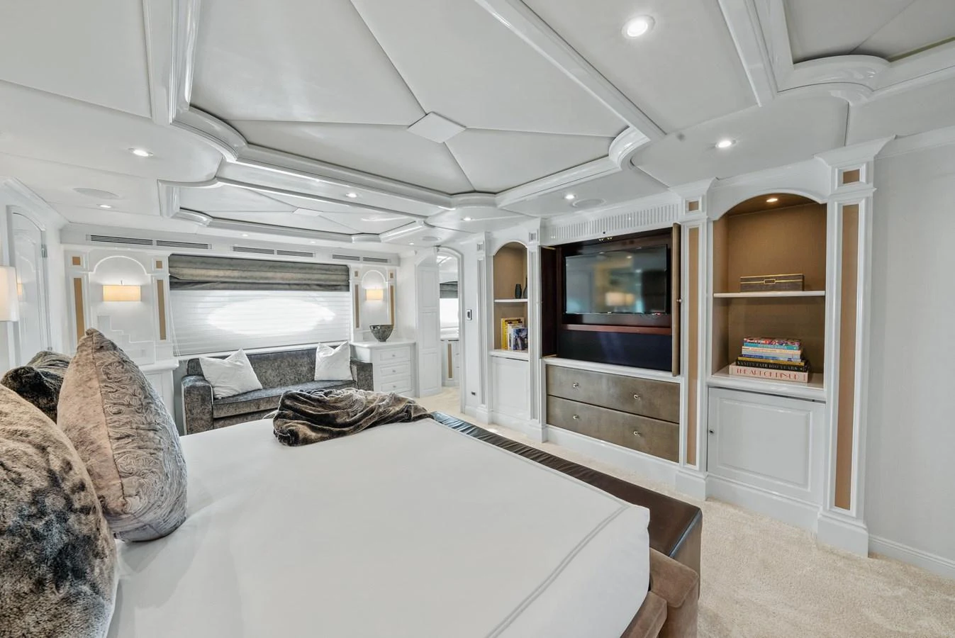 a bedroom with a large bed aboard NICOLE EVELYN Yacht for Sale