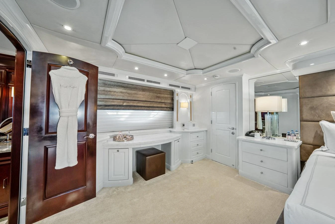 a large bathroom with a large wooden closet aboard NICOLE EVELYN Yacht for Sale