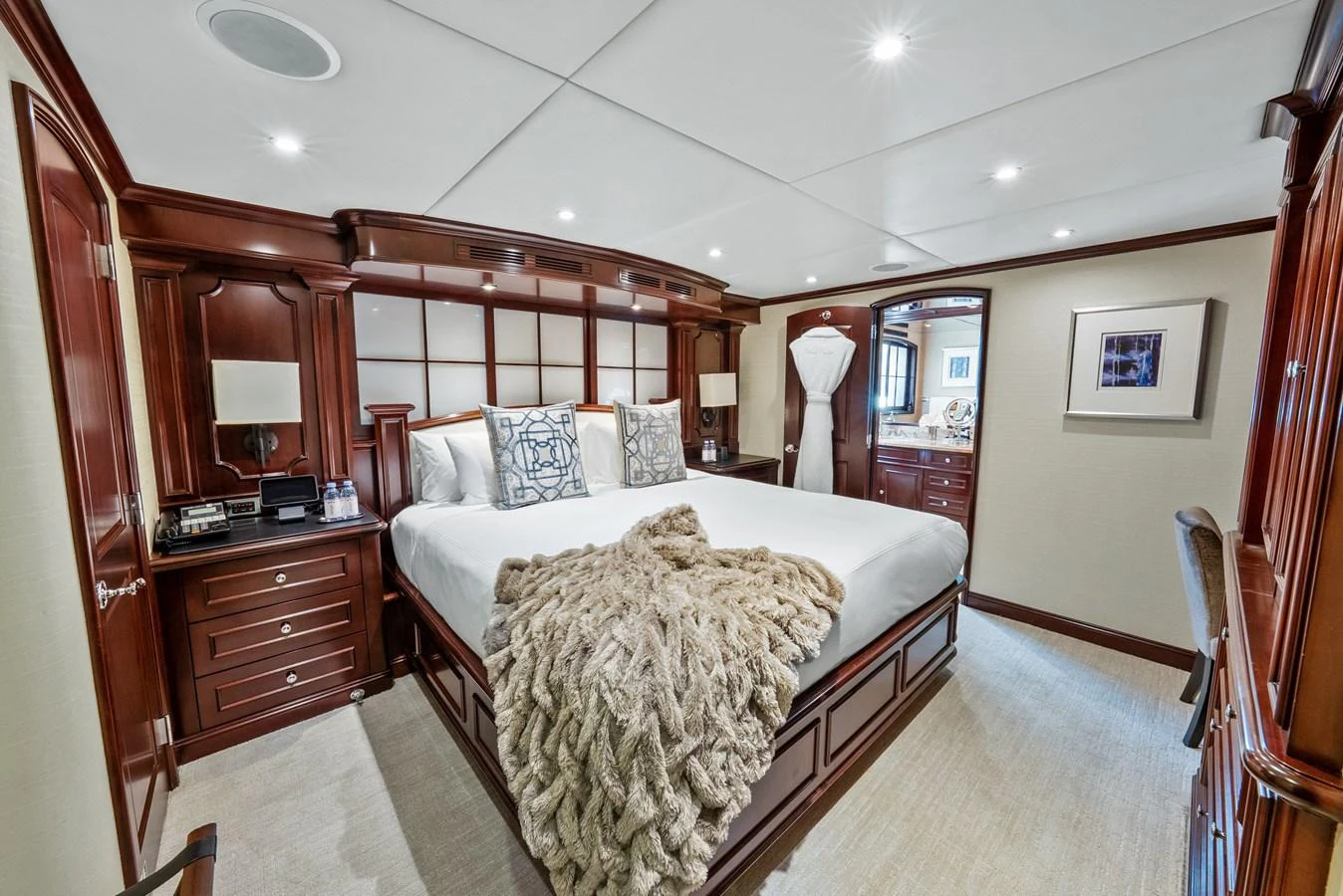 a large bedroom with a large bed aboard NICOLE EVELYN Yacht for Sale