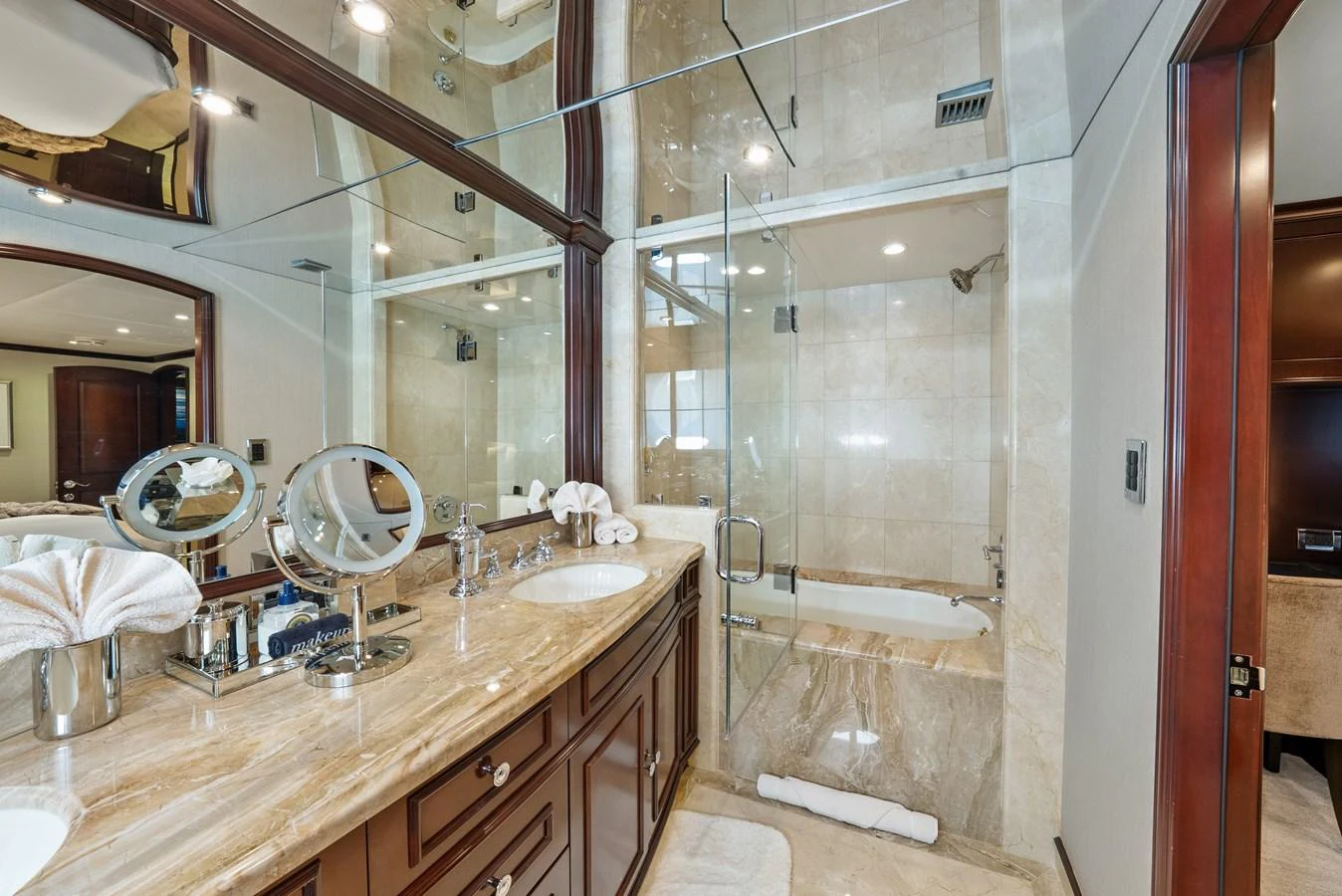 a bathroom with a glass shower aboard NICOLE EVELYN Yacht for Sale