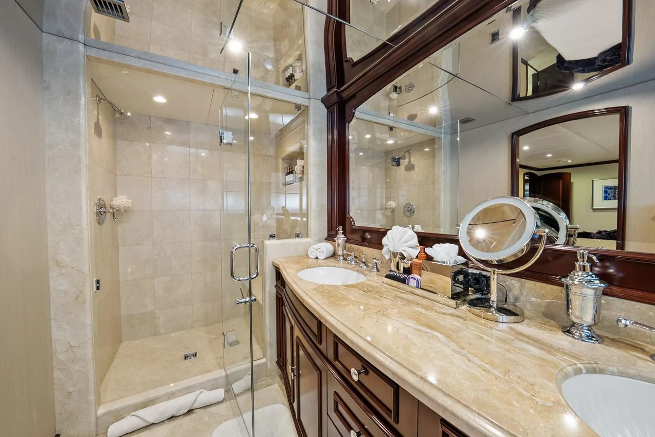 a bathroom with a shower and sink aboard NICOLE EVELYN Yacht for Sale