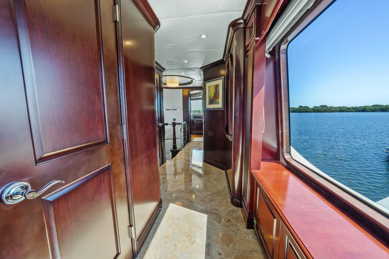 a train with a view of the water and the land below aboard NICOLE EVELYN Yacht for Sale