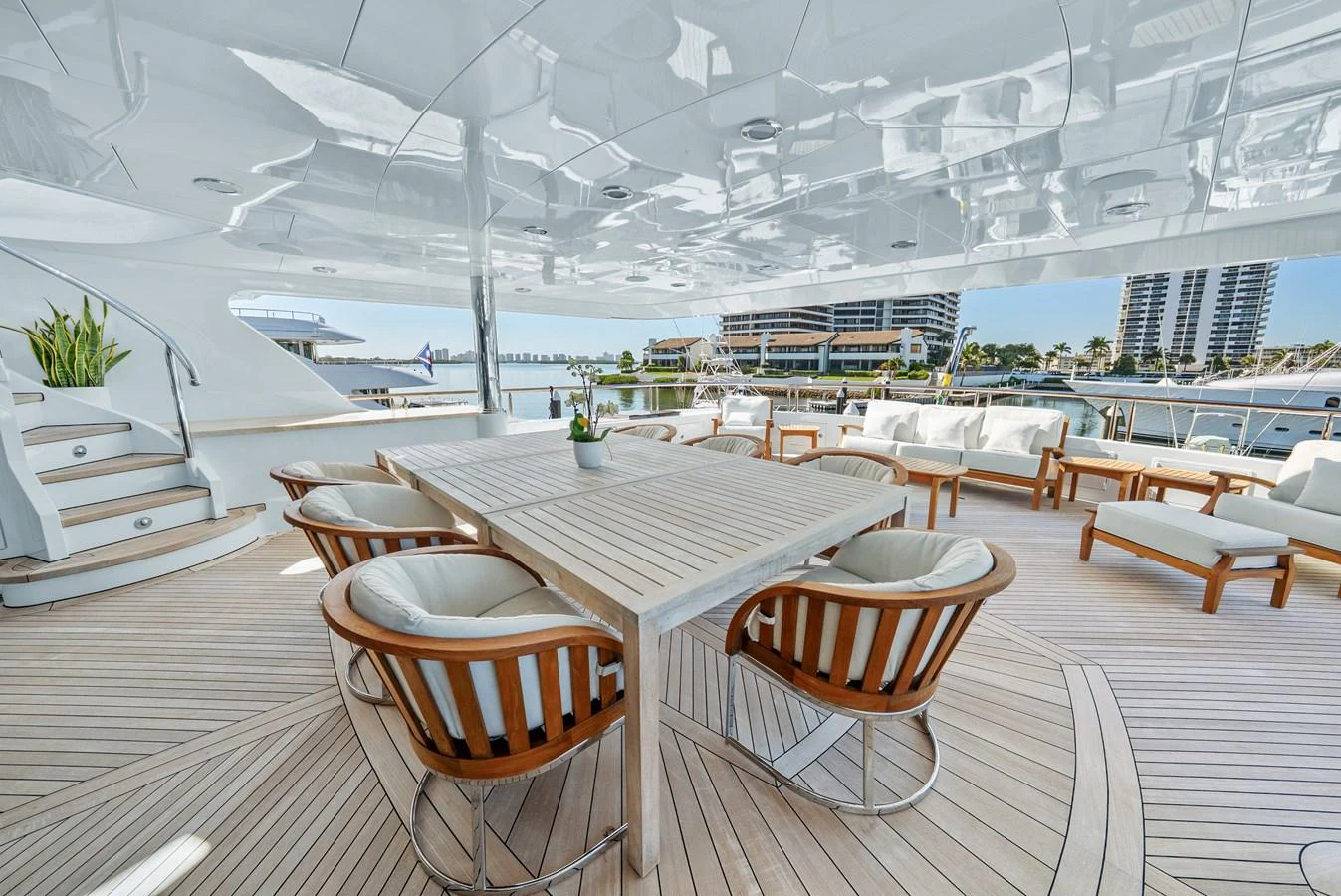 tables and chairs in a room aboard NICOLE EVELYN Yacht for Sale