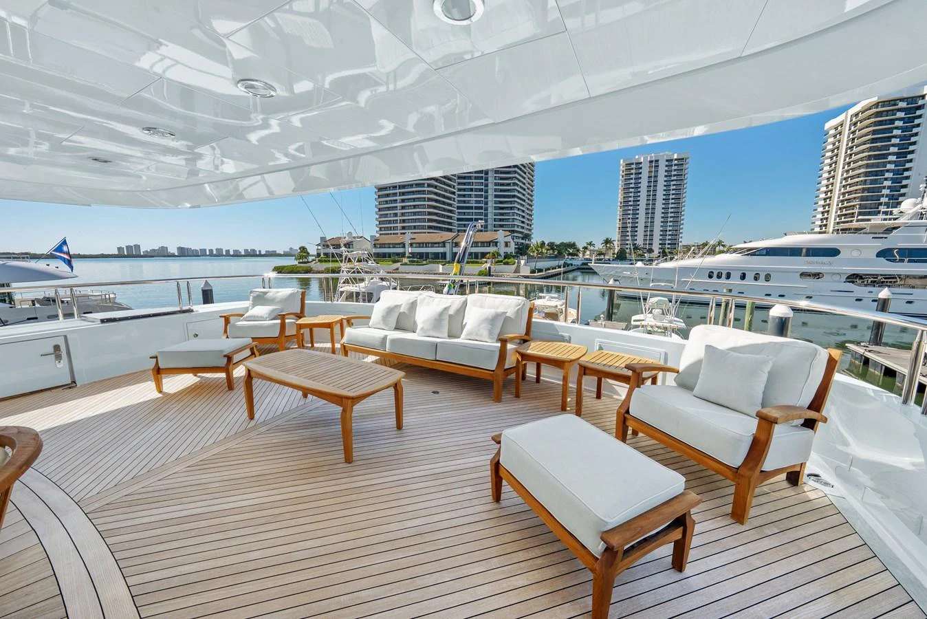 a room with a view of a city and a large body of water aboard NICOLE EVELYN Yacht for Sale