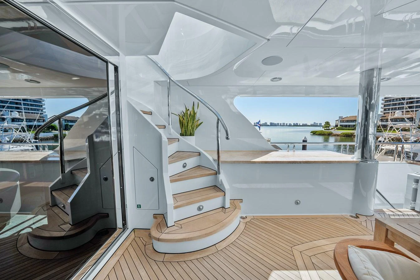 a room with a large window and a view of the water aboard NICOLE EVELYN Yacht for Sale