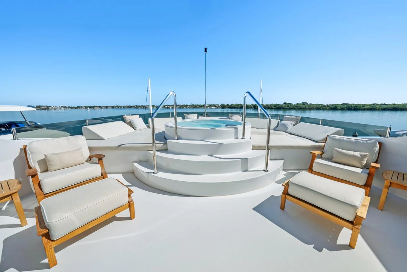 a group of chairs on a beach aboard NICOLE EVELYN Yacht for Sale