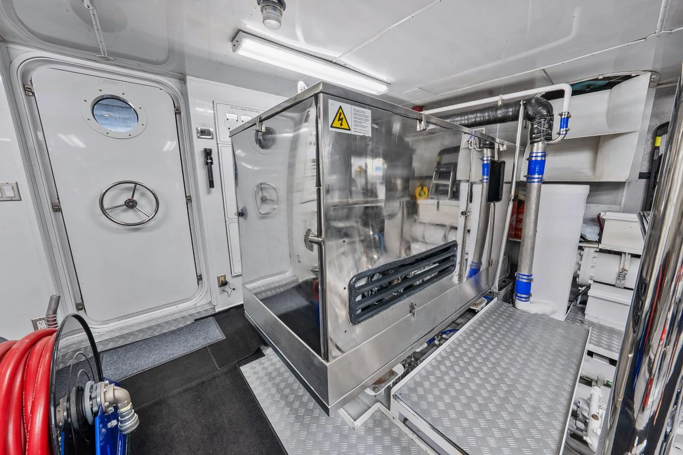 a room with machines aboard NICOLE EVELYN Yacht for Sale