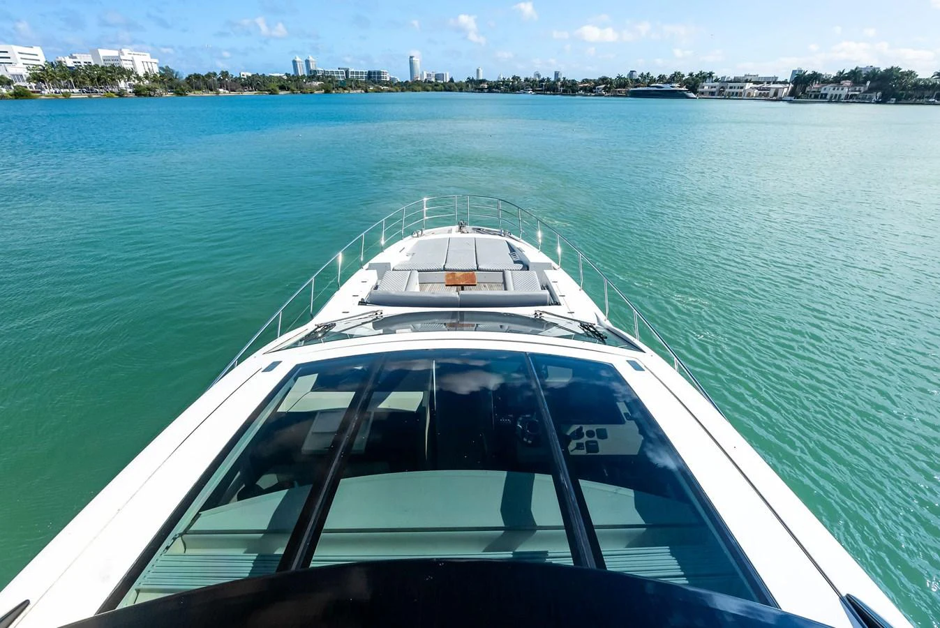 The yacht's bow offers a sleek and modern design with expansive views of the surrounding waters. aboard PANDA Yacht for Sale