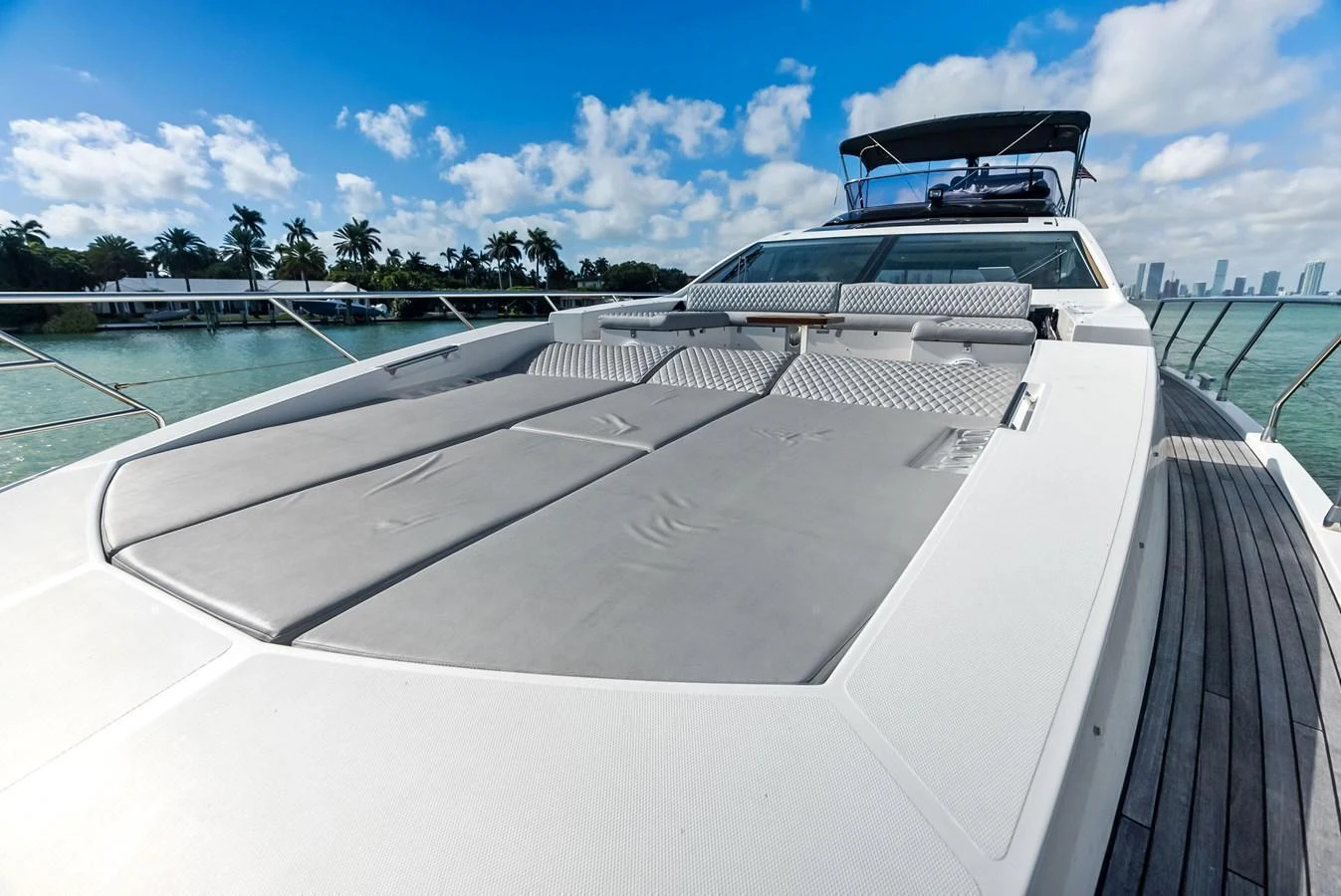 The foredeck features spacious sun pads for ultimate relaxation under the open sky. aboard PANDA Yacht for Sale