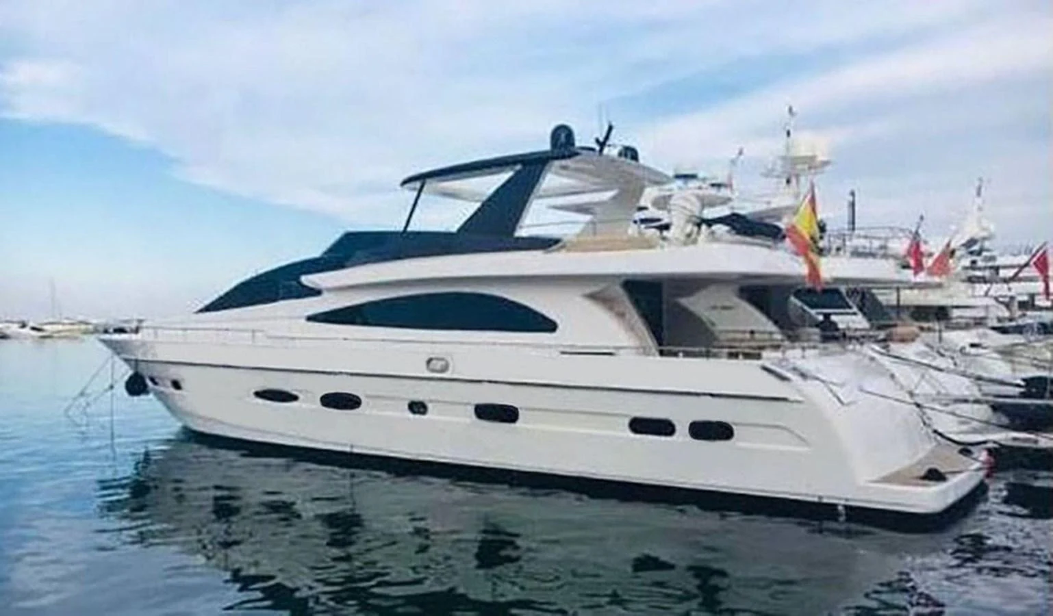 a white yacht on the water aboard YAIZA Yacht for Sale