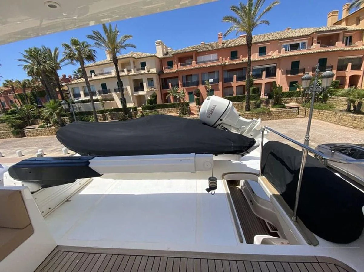 a pool with a black umbrella aboard YAIZA Yacht for Sale
