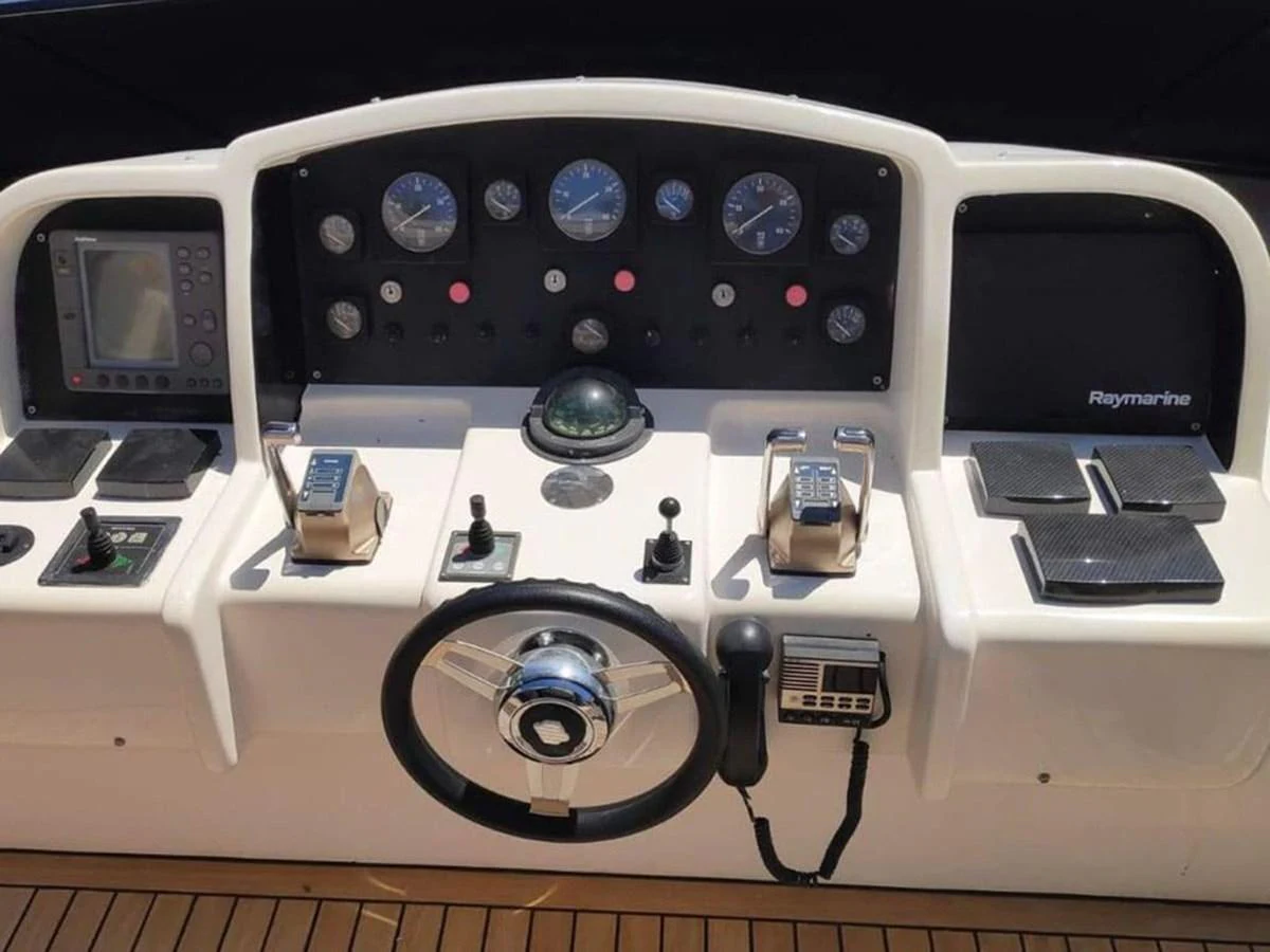 a black electronic device with a screen and buttons aboard YAIZA Yacht for Sale